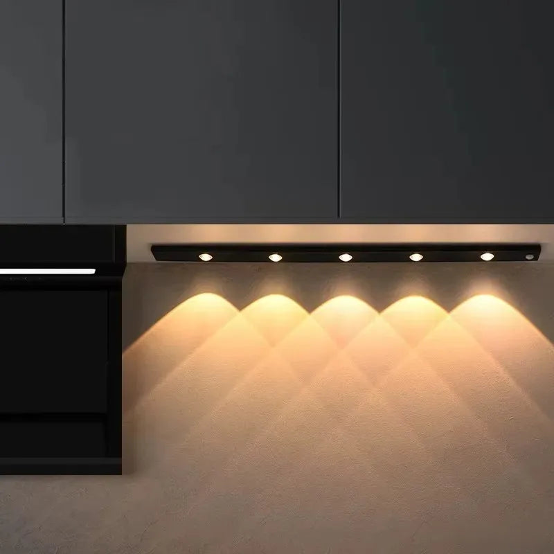 LumaSense Motion Sensor Light installed under kitchen cabinet with warm white glow